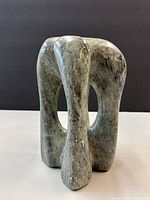 Front view of stone abstract sculpture