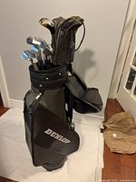 Full view of Dunlop golf bag loaded with clubs