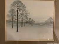 Close view of print showing winter landscape and trees