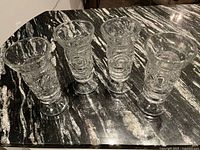Four Mondae Siren glasses on countertop