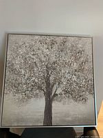 Full view of framed snow scene painting front