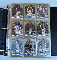 Binder page with gold-border All-Star subset cards (Barkley, Bird, Dumars, Ewing, Jordan, McHale, Miller, Parish, Pippen)