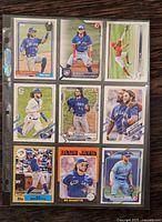 Front view of all nine Bo Bichette cards in binder sleeve