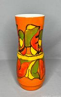 Front view of tall orange Delphis vase