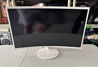 Front view of Samsung curved monitor powered off