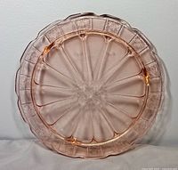Top view of pink Doric cake plate