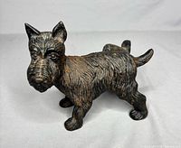 Front left view of cast iron Scottie dog doorstop