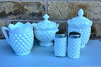 Group shot of entire hobnail milk-glass set