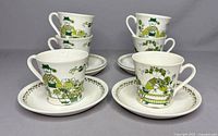Front view of all six cup and saucer sets