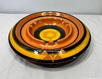 Angled view showing rim design, bowl and paint scheme