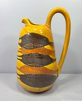 Front view of Royal Haeger Earth Wrap ewer vase