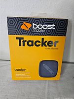 Front of sealed Boost Mobile Tracker retail box