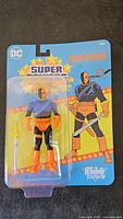 Front of sealed Deathstroke Super Powers figure on blister card
