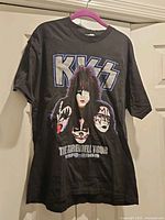 Full view of front of T-shirt on hanger