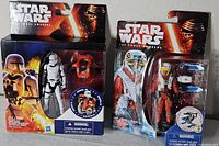 Front view of both sealed Star Wars The Force Awakens action-figure packs