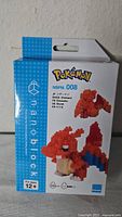 Front of sealed Nanoblock Charizard NBPM_008 box