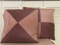 Both pillows front view showing patchwork pattern