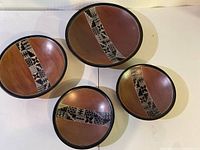 Top view of complete set of four soapstone plates