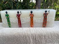 Front view showing full artwork and candle size