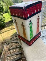 Full view showing three painted panels and intact top wick