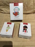 Front of all three boxed Hallmark Keepsake ornaments