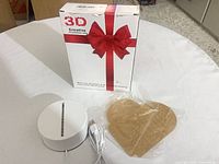 Box marked 3D Creative, LED base with USB cable, acrylic panel still wrapped