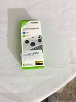 Front of retail box showing Dobe wireless keyboard image and features