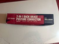 Front of Fit Geno 2-in-1 back brace and posture corrector box