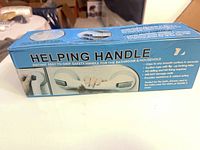 Front of retail box showing product name and image of grab bar