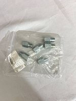 Bag containing six hex standoff spacers