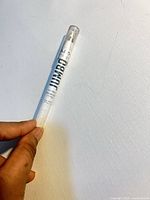 Full NYX Jumbo Eye Pencil held horizontally, shrink-wrap intact