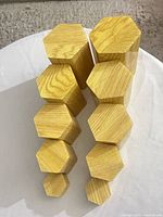 Full set of ten hexagonal pedestals viewed from above showing varying heights