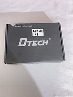 Closed DTECH retail box front