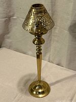 Full assembled candlestick with shade