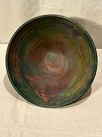 Interior view of raku-glazed bowl showing multicolour finish