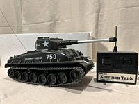 Left side view of tank with controller attached by wire