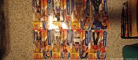 Front view of all eight carded WWE figures laid out