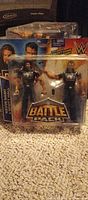 Front view of sealed Battle Pack showing both figures and microphone