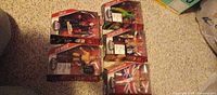 All five carded WWE Elite figures grouped on carpet