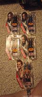 Six carded WWE figures displayed front