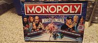 Front view of sealed Monopoly WrestleMania Edition box