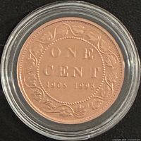 Reverse of proof 1908–1998 one cent coin in capsule