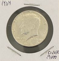 Obverse of 1964 Kennedy half dollar in 2x2 flip