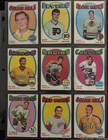 Front view of nine O-Pee-Chee hockey cards in protective page