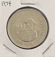 Obverse of 1974 Edmonton trade dollar showing Mountie, RCMP centennial legend