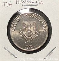 Obverse of 1974 City of Mississauga trade dollar in holder