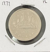 Reverse of 1977 Canadian dollar in holder