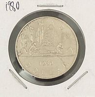 Reverse showing Voyageur canoe design, date 1980