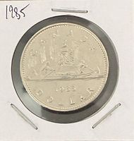 Reverse of 1985 Canadian one-dollar coin showing Voyageur design