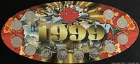 Front of oval presentation card showing twelve coins and 1999 graphics